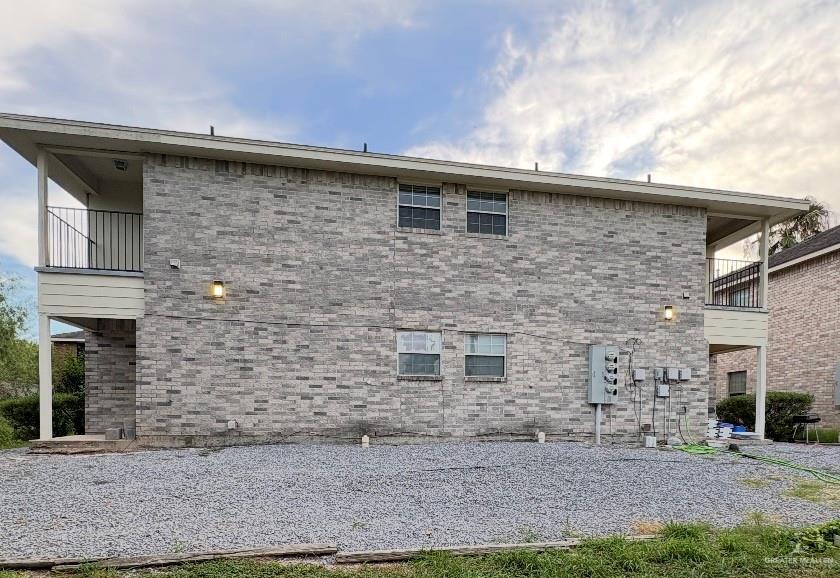 1521 Oasis Drive Mission, TX 78572 - Photo 3 of 18 a front view of a house with stairs
