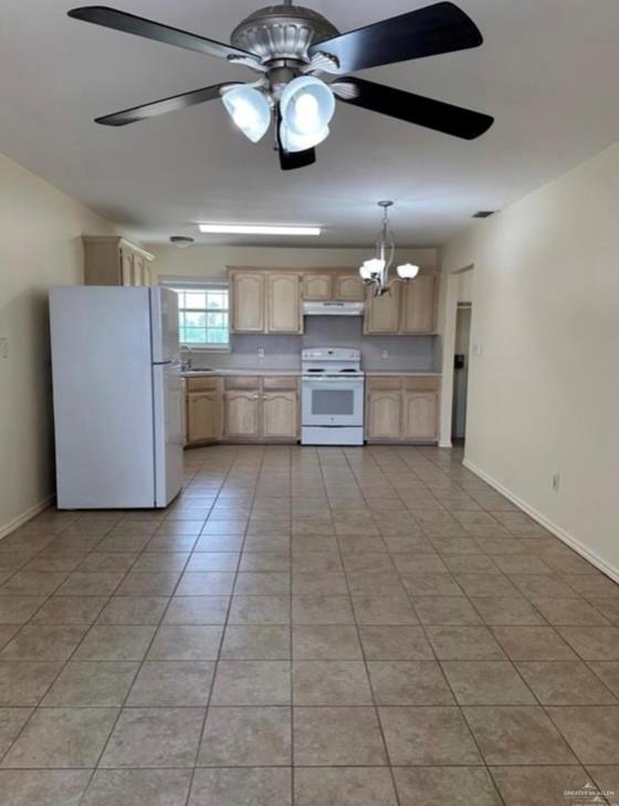1521 Oasis Drive Mission, TX 78572 - Photo 4 of 18 a view of a kitchen with a sink and cabinets