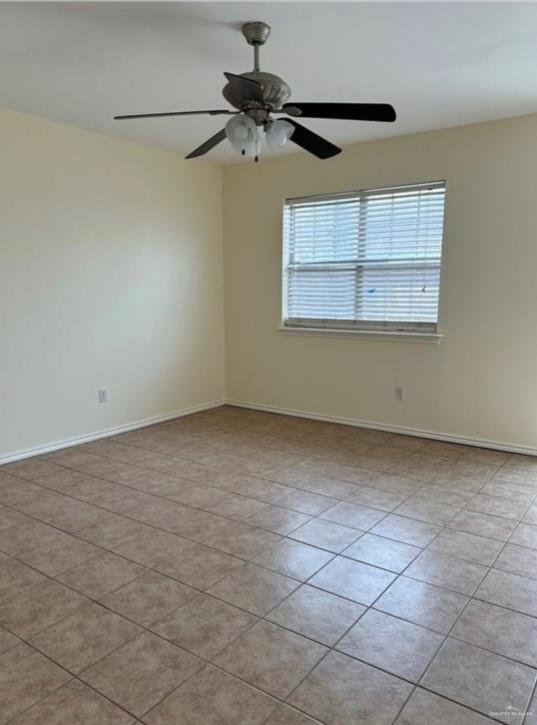 1521 Oasis Drive Mission, TX 78572 - Photo 6 of 18 a view of an empty room with a window