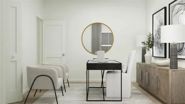 a living room with furniture a mirror and a potted plant