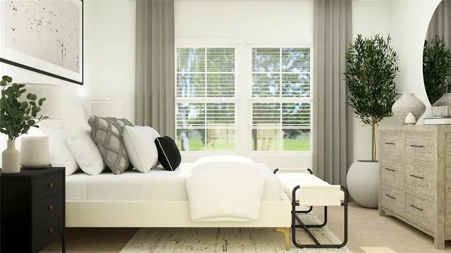 a bedroom with bed and windows