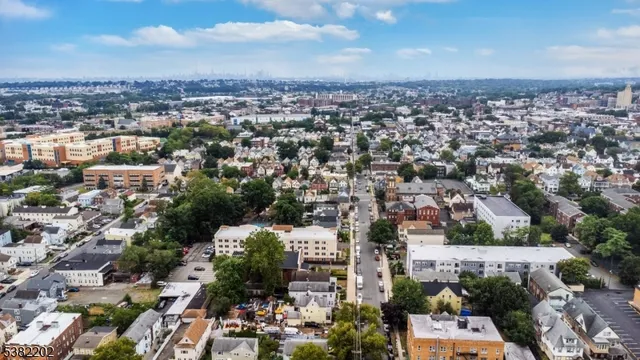 an aerial view of a house with a garden