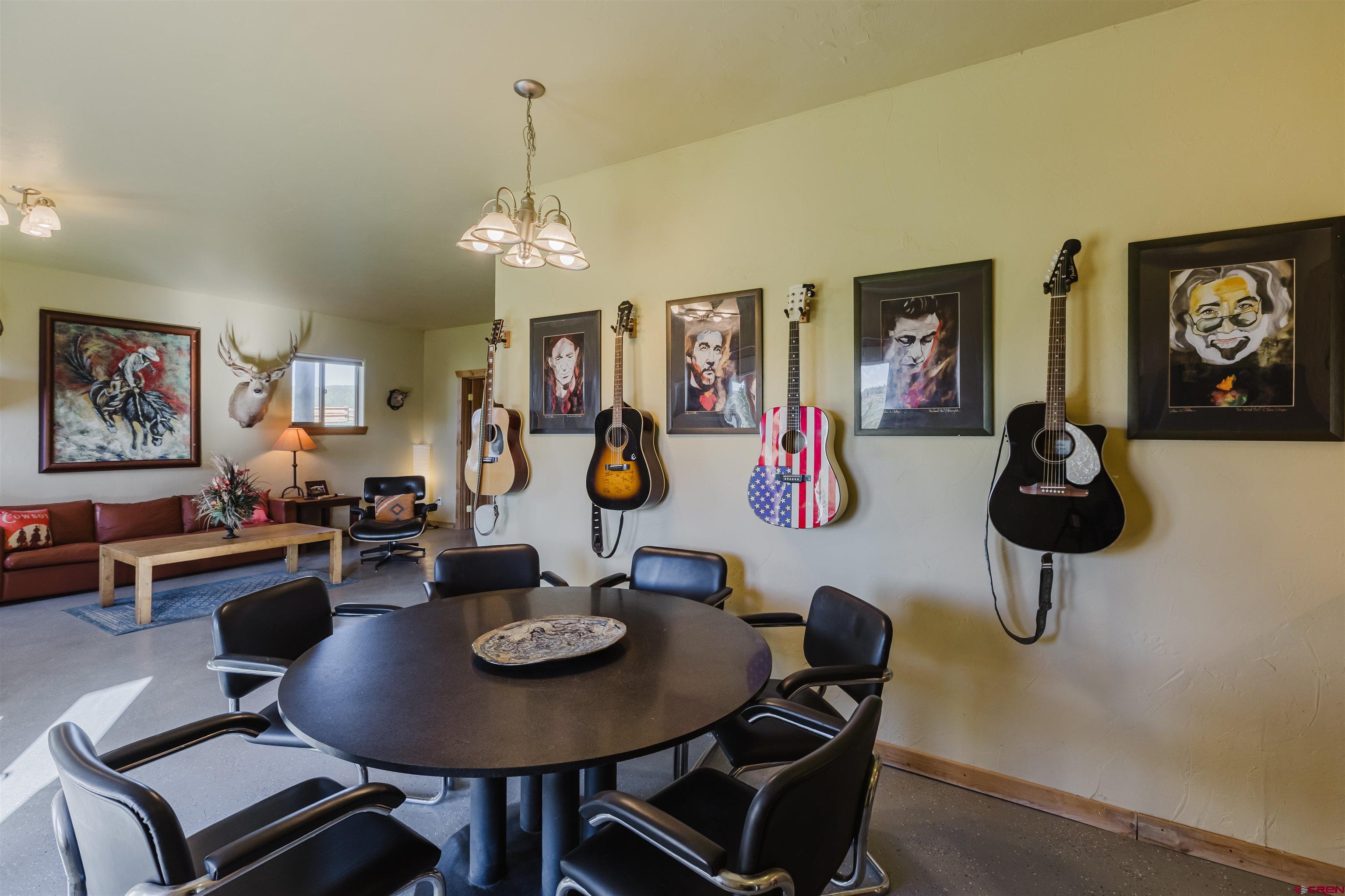 2439 County Road 359 Pagosa Springs, CO 81147 - Photo 40 of 45 a view of a dining room with furniture