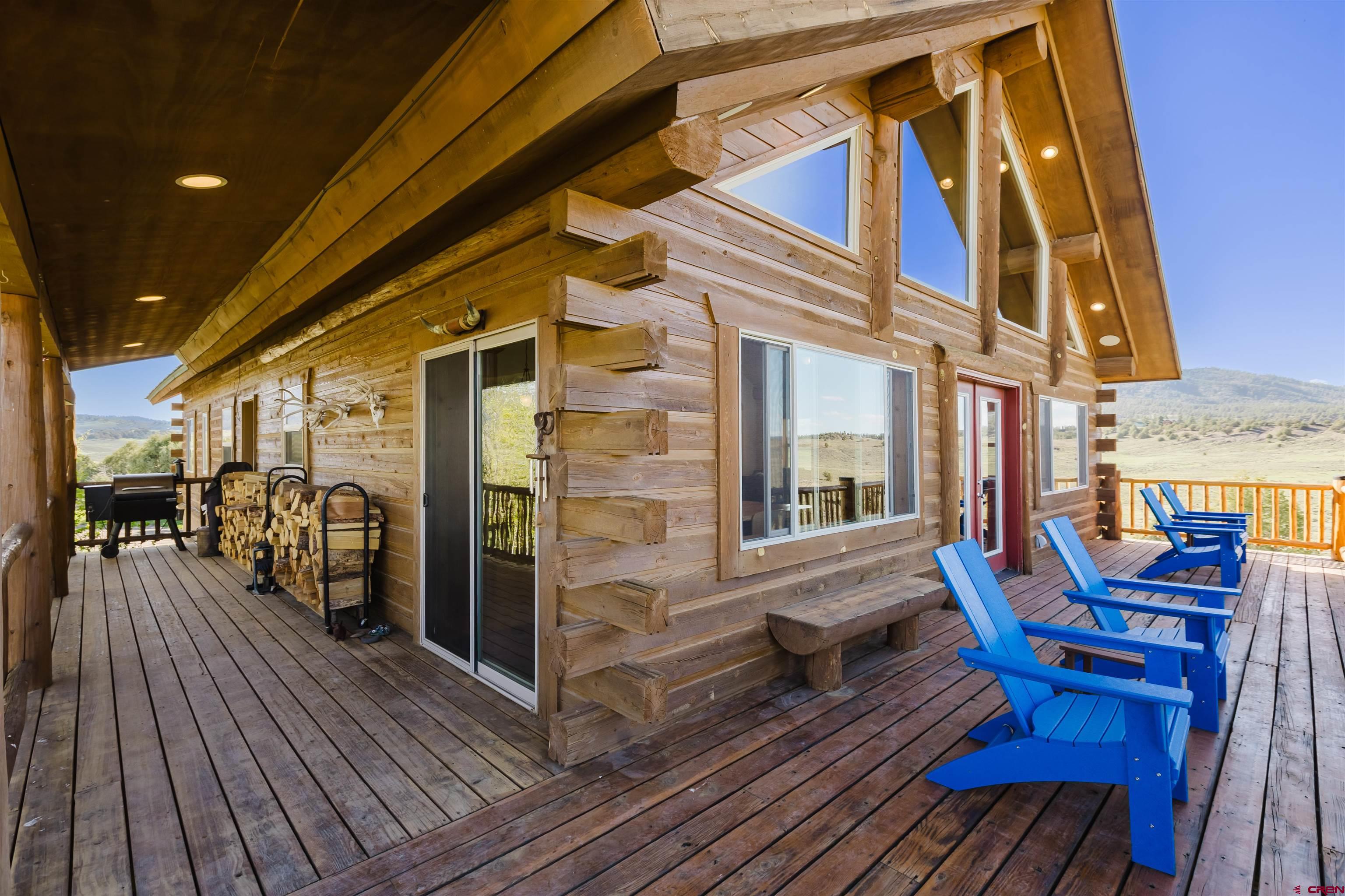 2439 County Road 359 Pagosa Springs, CO 81147 - Photo 4 of 45 a view of a chairs on the deck