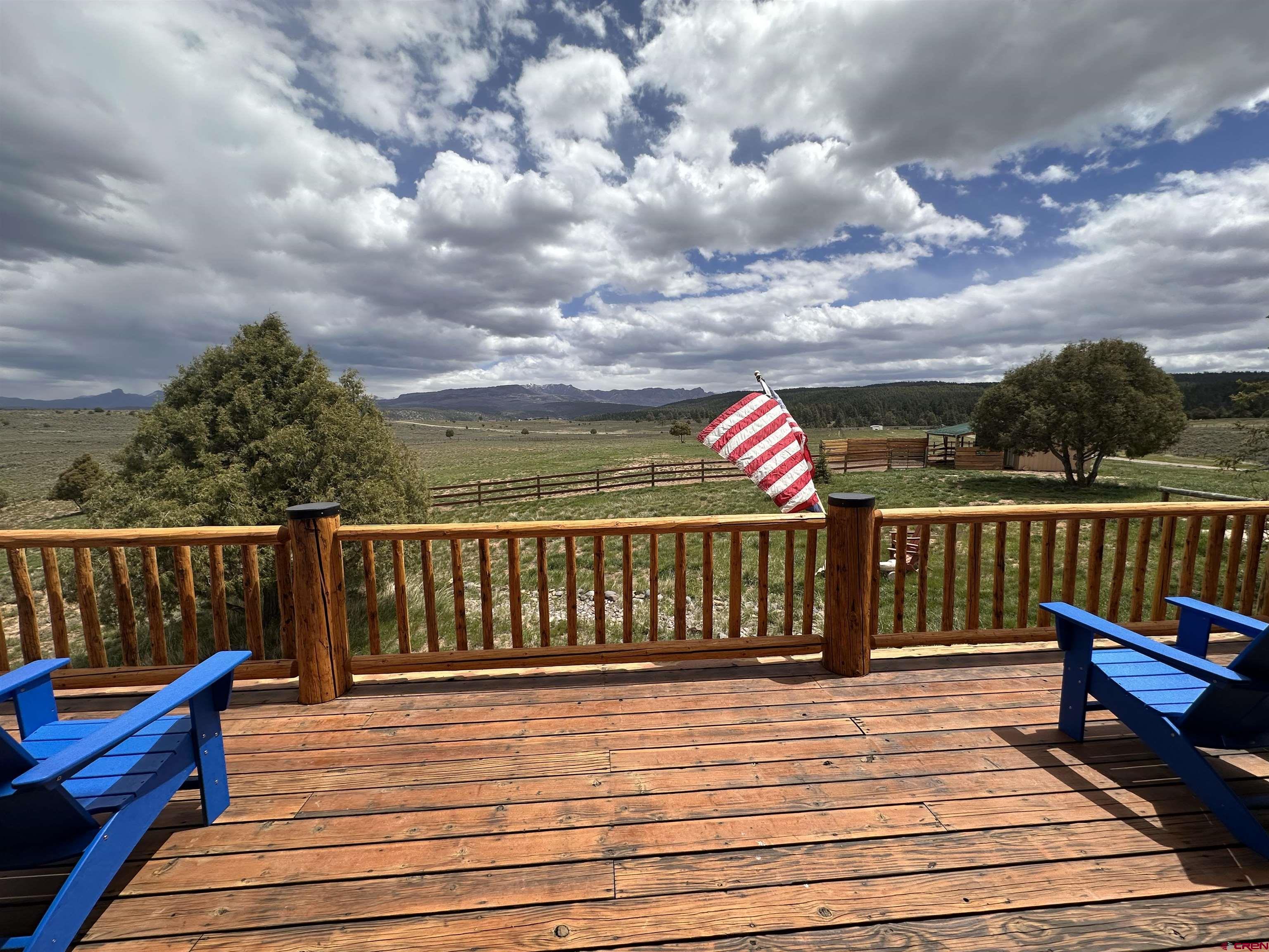 2439 County Road 359 Pagosa Springs, CO 81147 - Photo 8 of 45 a view of a balcony with wooden floor