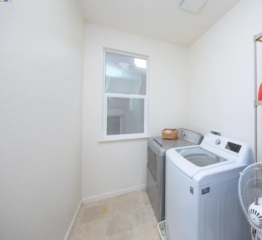 a bathroom with a sink and cabinets