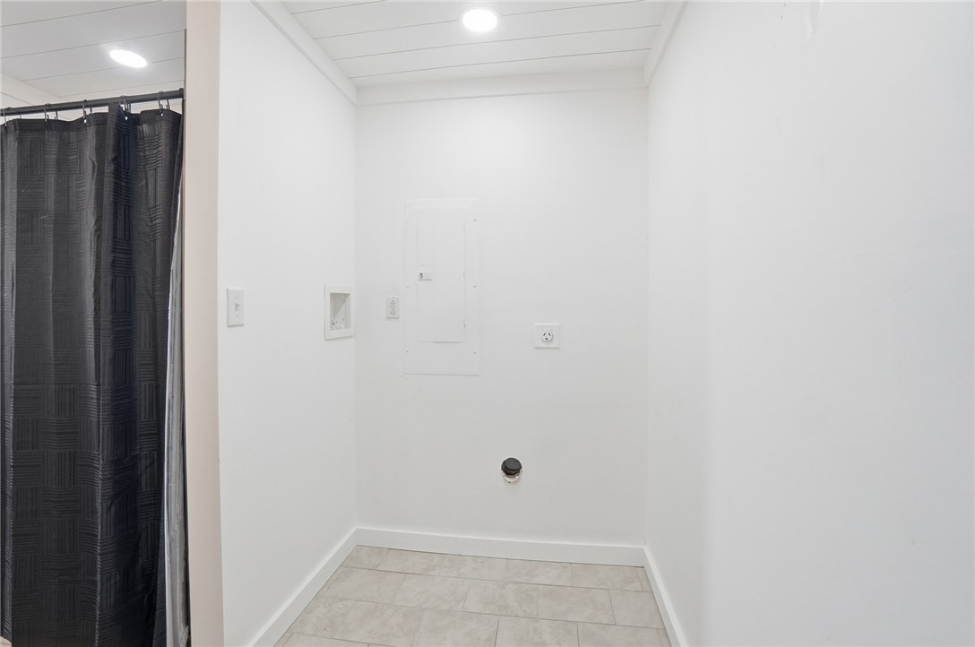 3991 Benner Road Miamisburg, OH 45342 - Photo 24 of 44 This dedicated utility room offers convenient in-home laundry solutions.
