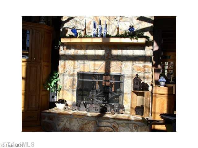 0 Dangler Mountain Road Stuart, VA 24171 - Photo 5 of 27 Den/Family/Great Room. Massive double sided woodburning fireplace.