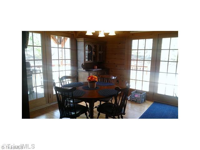 0 Dangler Mountain Road Stuart, VA 24171 - Photo 6 of 27 Dining Room. Cozy dining area with doors to the wraparound porch.