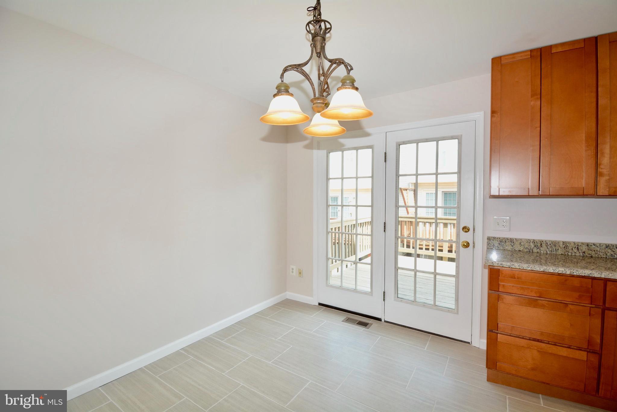 6494 Topsails Lane Springfield, VA 22150 - Photo 13 of 32 REMODELED KITCHEN OUT TO DECK