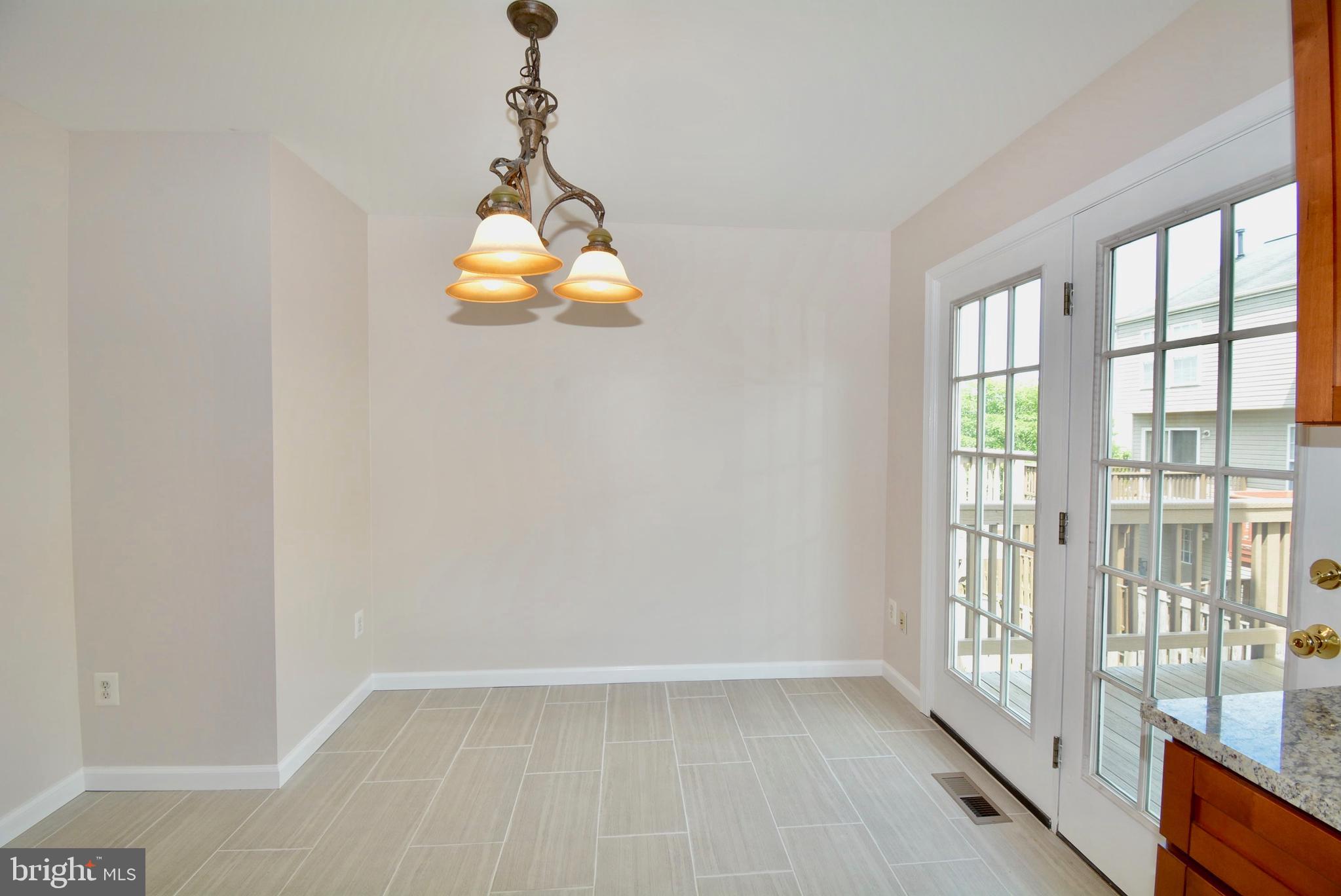 6494 Topsails Lane Springfield, VA 22150 - Photo 14 of 32 REMODELED KITCHEN EATING SPACE