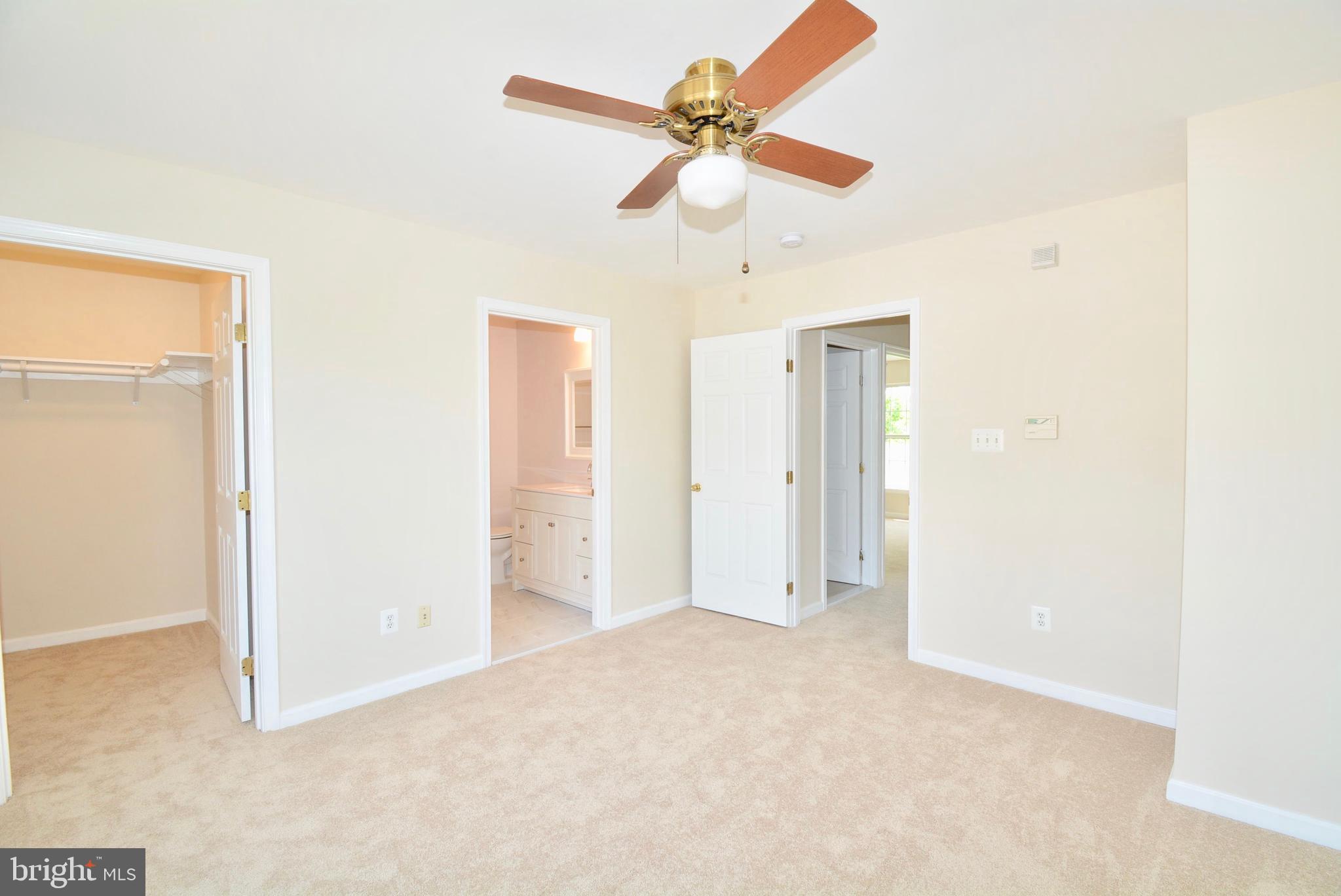 6494 Topsails Lane Springfield, VA 22150 - Photo 20 of 32 MASTER BEDROOM WITH WALK IN CLOSET