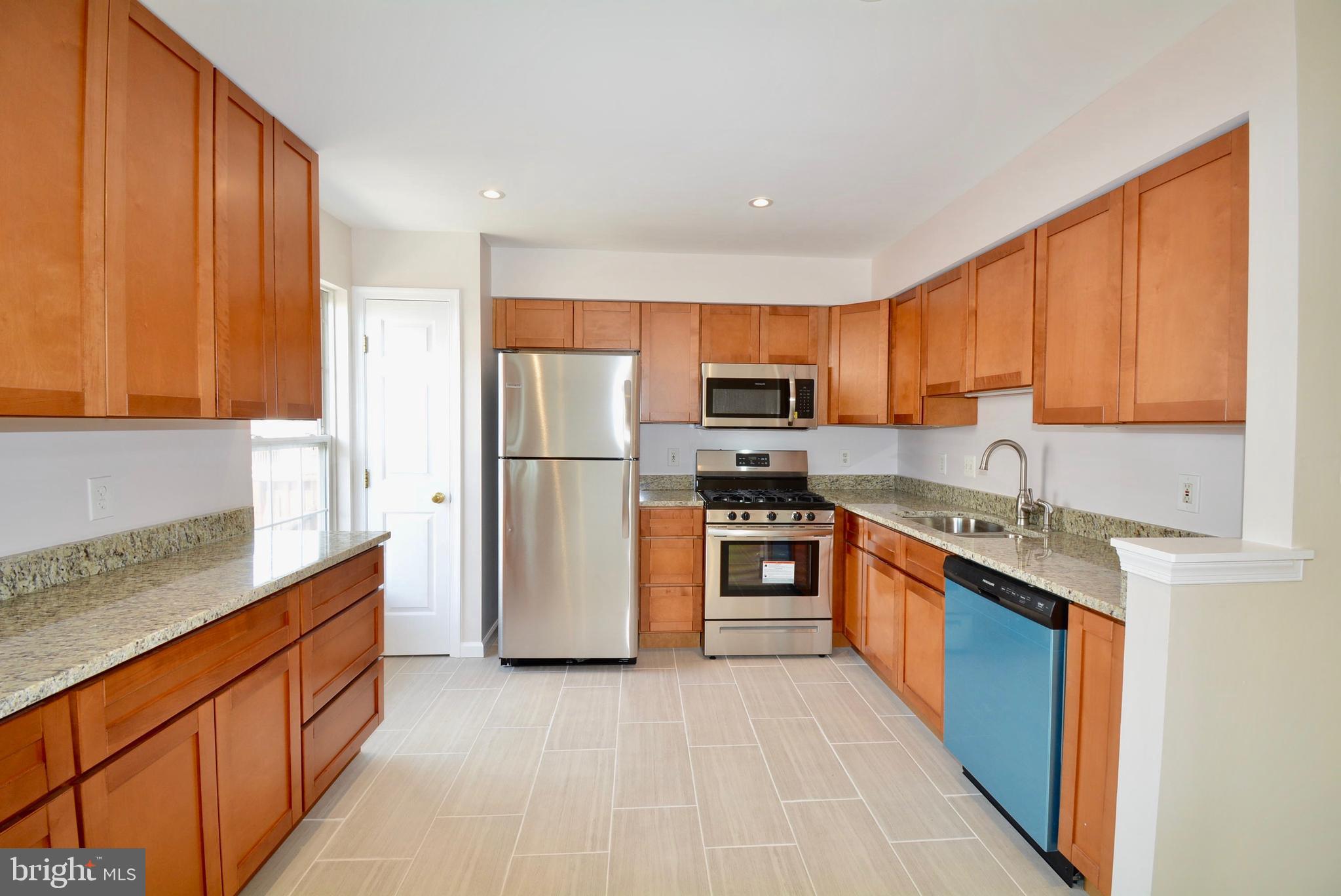 6494 Topsails Lane Springfield, VA 22150 - Photo 9 of 32 REMODELED KIT WITH PORCELAIN FLOOR