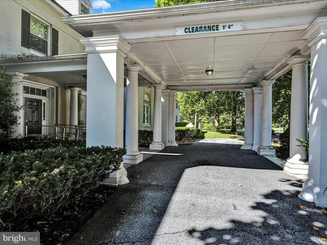 a view of a house with swimming pool