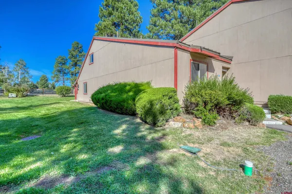 a view of a back yard of the house