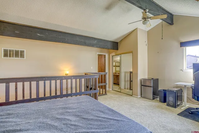 a view of livingroom with furniture and windows