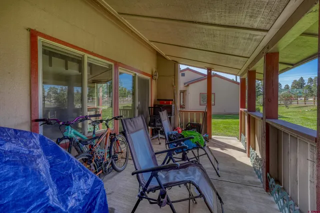 a view of an outdoor space with furniture