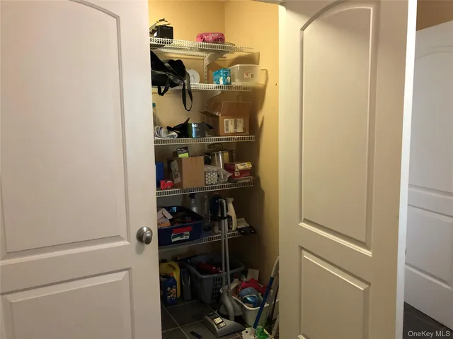 a room with storage and utility room