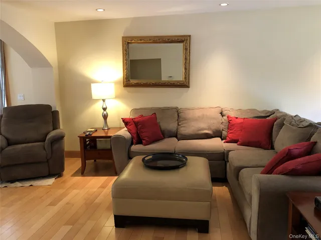 a living room with a couch and a couch