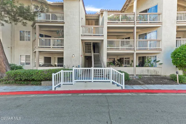 a front view of multi story residential apartment building