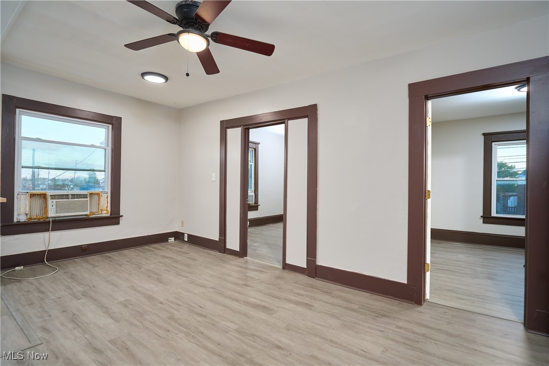 5432 State Road Parma, OH 44134 - Photo 27 of 47 Spare room with light wood-type flooring and a ceiling fan