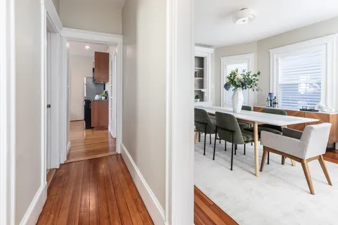 a room with furniture and a wooden floor