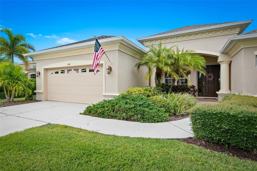 344 Snapdragon Loop Bradenton, FL 34212 - Photo 1 of 1 front view of a house with a yard