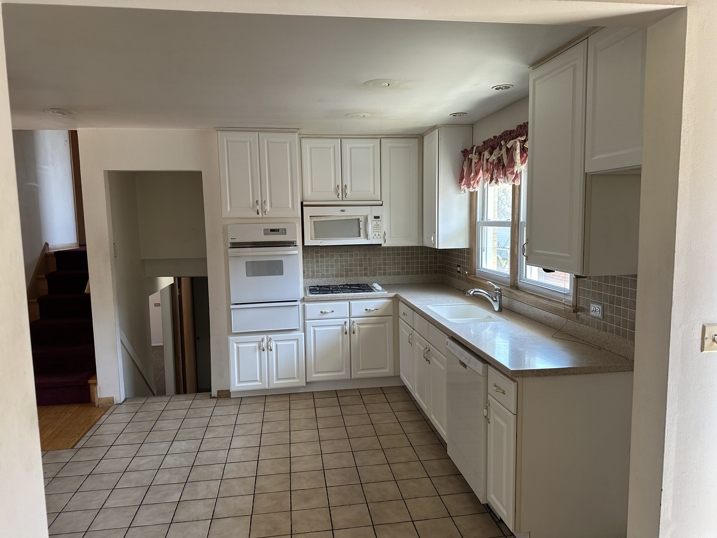 8517 South Kilbourn Avenue Chicago, IL 60652 - Photo 7 of 21 a kitchen with stainless steel appliances granite countertop a refrigerator and a sink