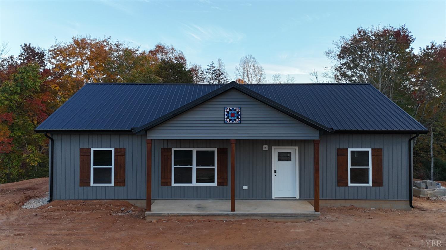 330 Bellview Road Appomattox, VA 24522 - Photo 1 of 26 a front view of a house with a garden and yard
