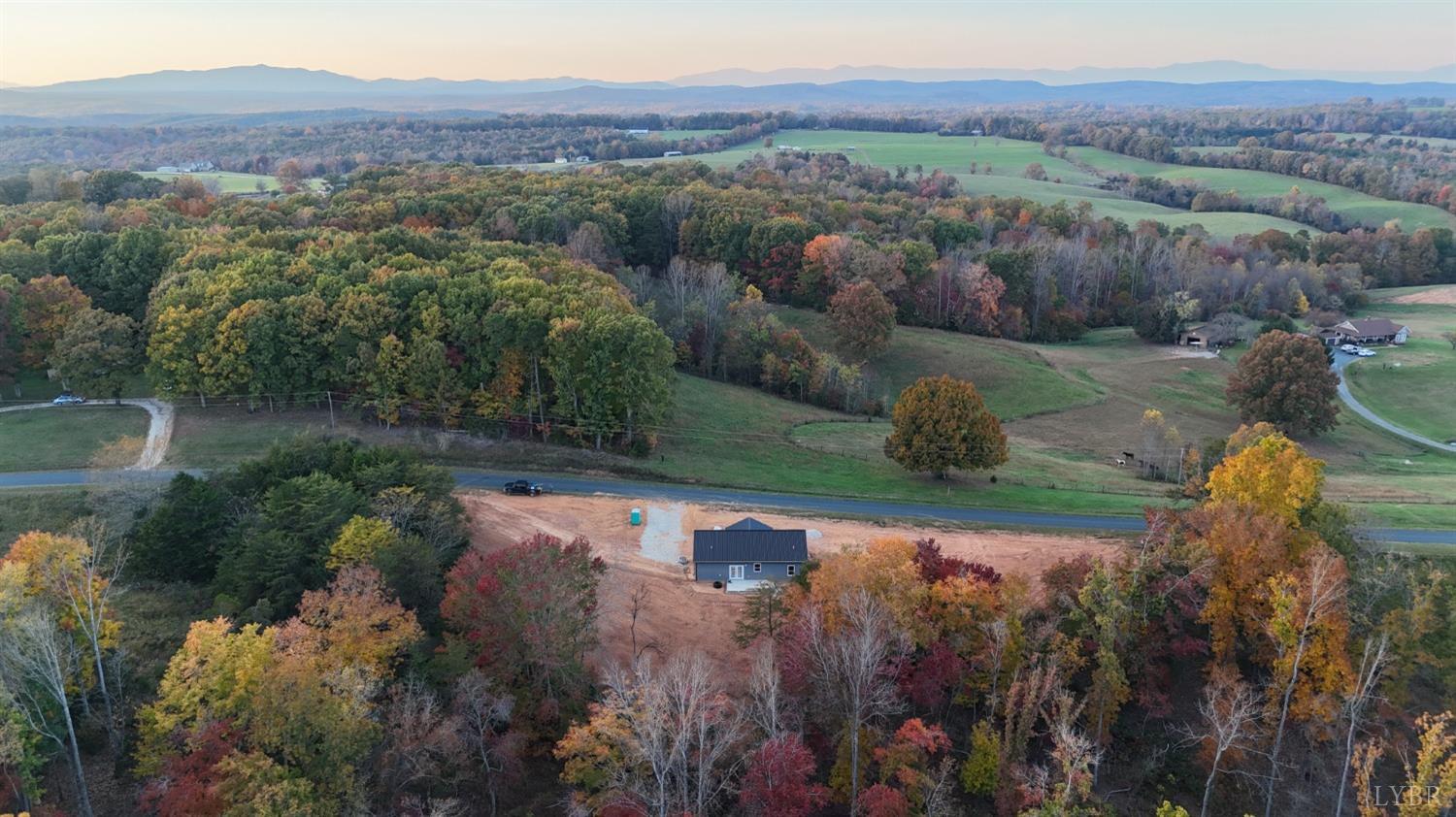330 Bellview Road Appomattox, VA 24522 - Photo 5 of 26 a view of a lake with a forest