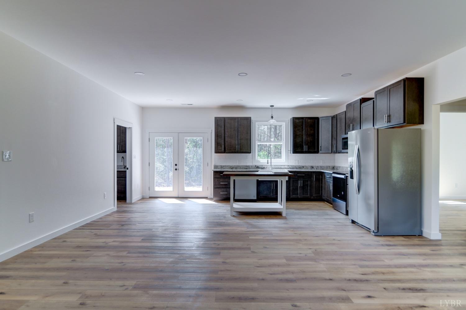 330 Bellview Road Appomattox, VA 24522 - Photo 8 of 26 a large kitchen with a center island stainless steel appliances and cabinets