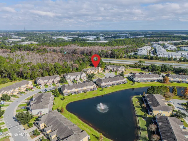 an aerial view of a with a swimming pool yard and outdoor seating