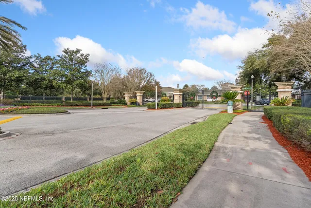 a view of a park with houses