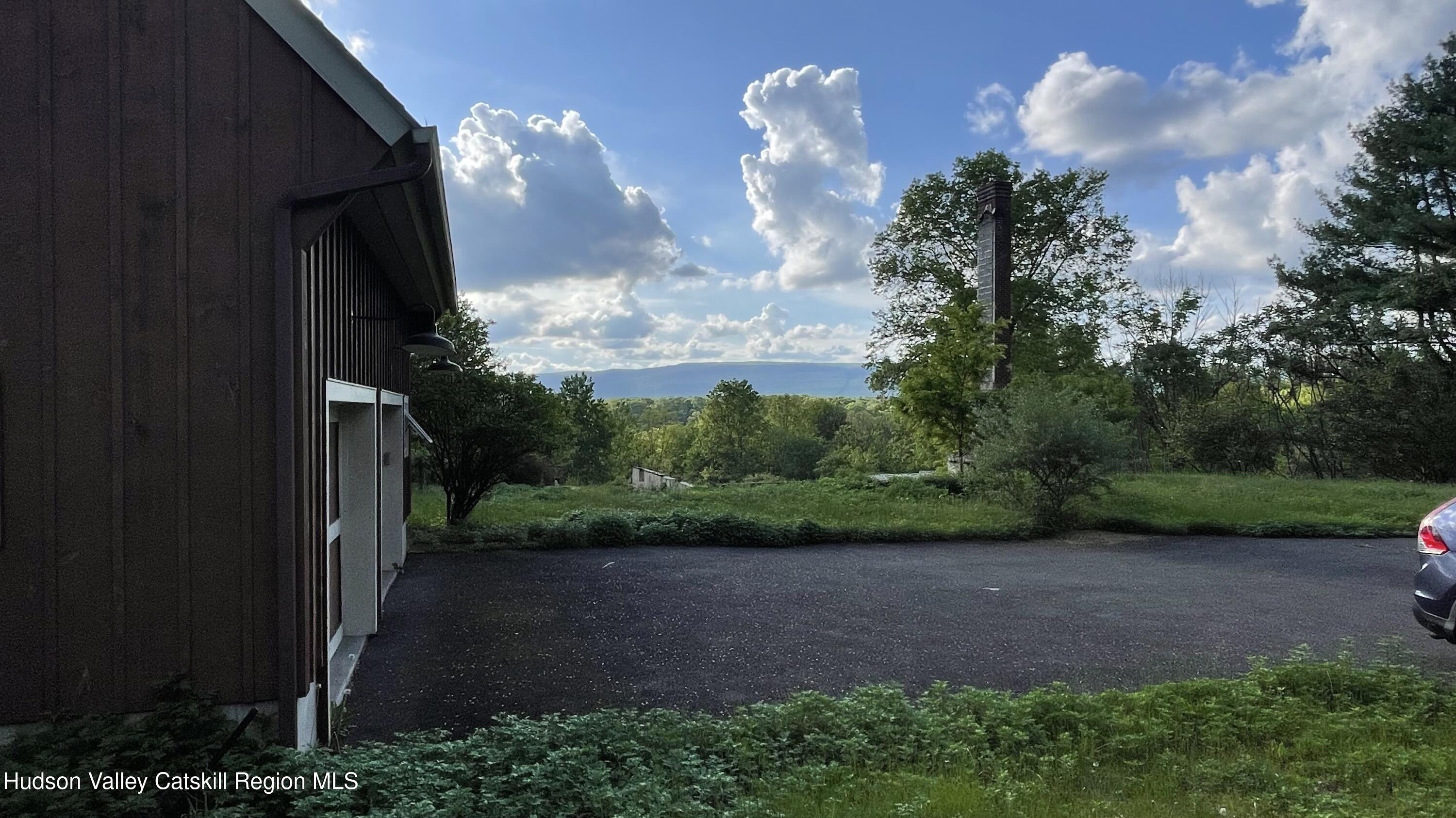 a view of a yard in front of a house