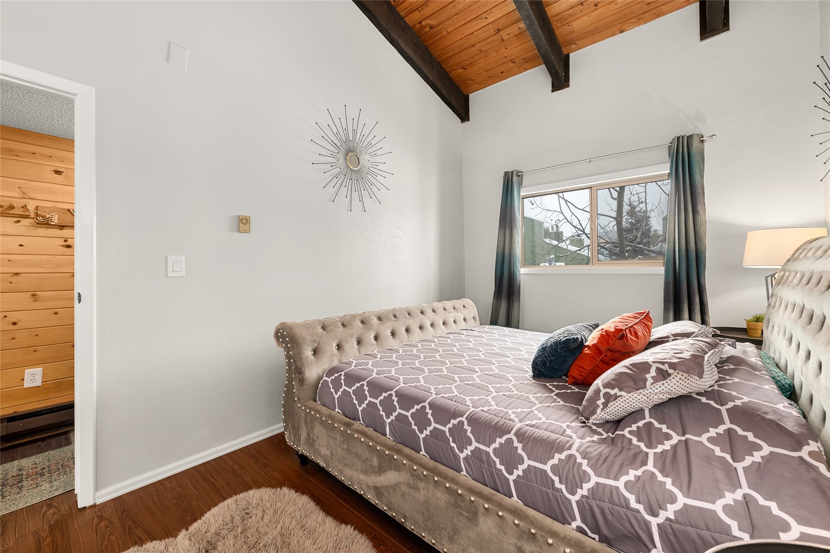 1335 Walton Creek Road, Unit 35 Steamboat Springs, CO 80487 - Photo 22 of 48 a bedroom with a bed and a window