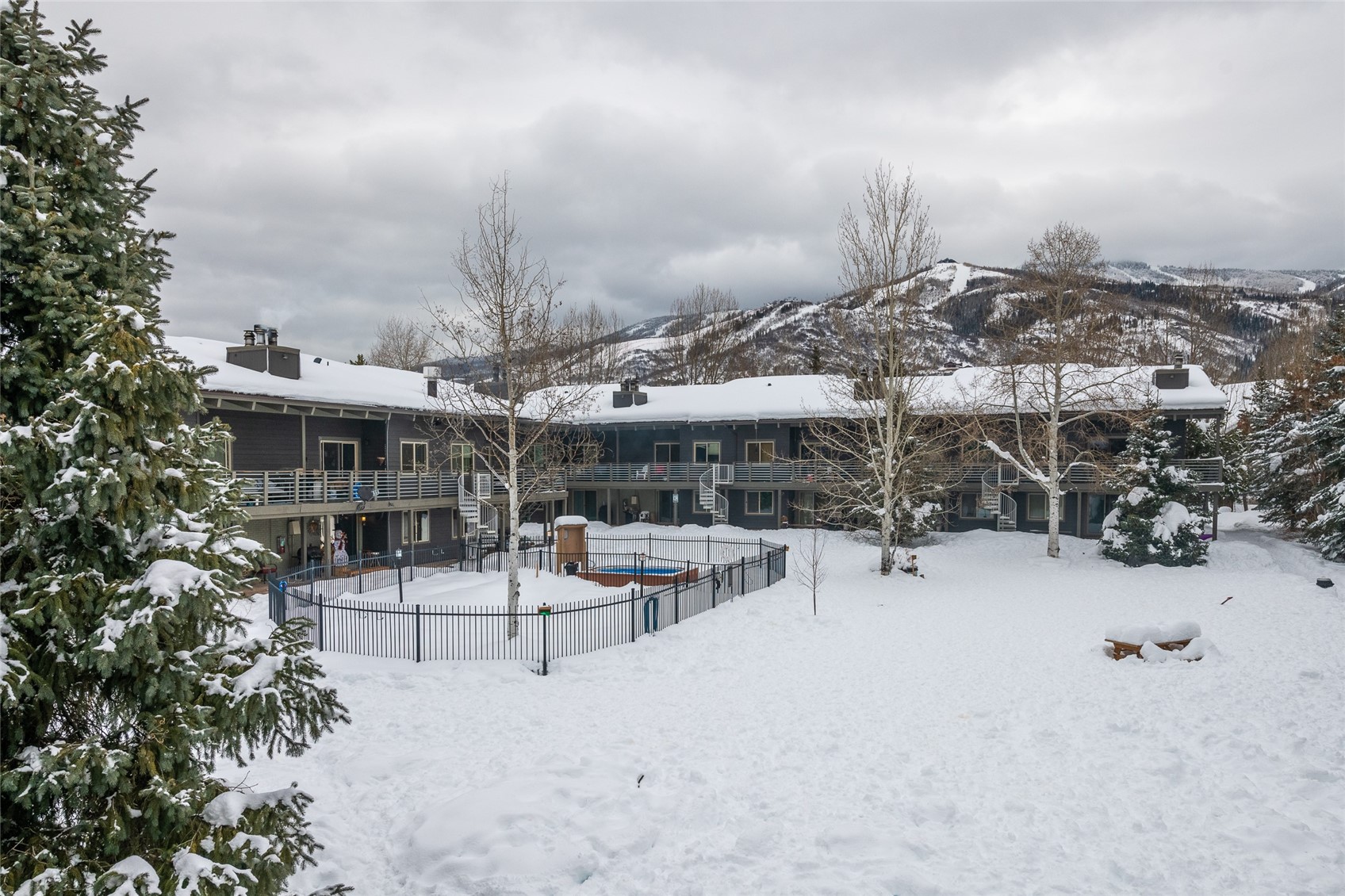 1335 Walton Creek Road, Unit 35 Steamboat Springs, CO 80487 - Photo 47 of 48 a view of a terrace with sitting area