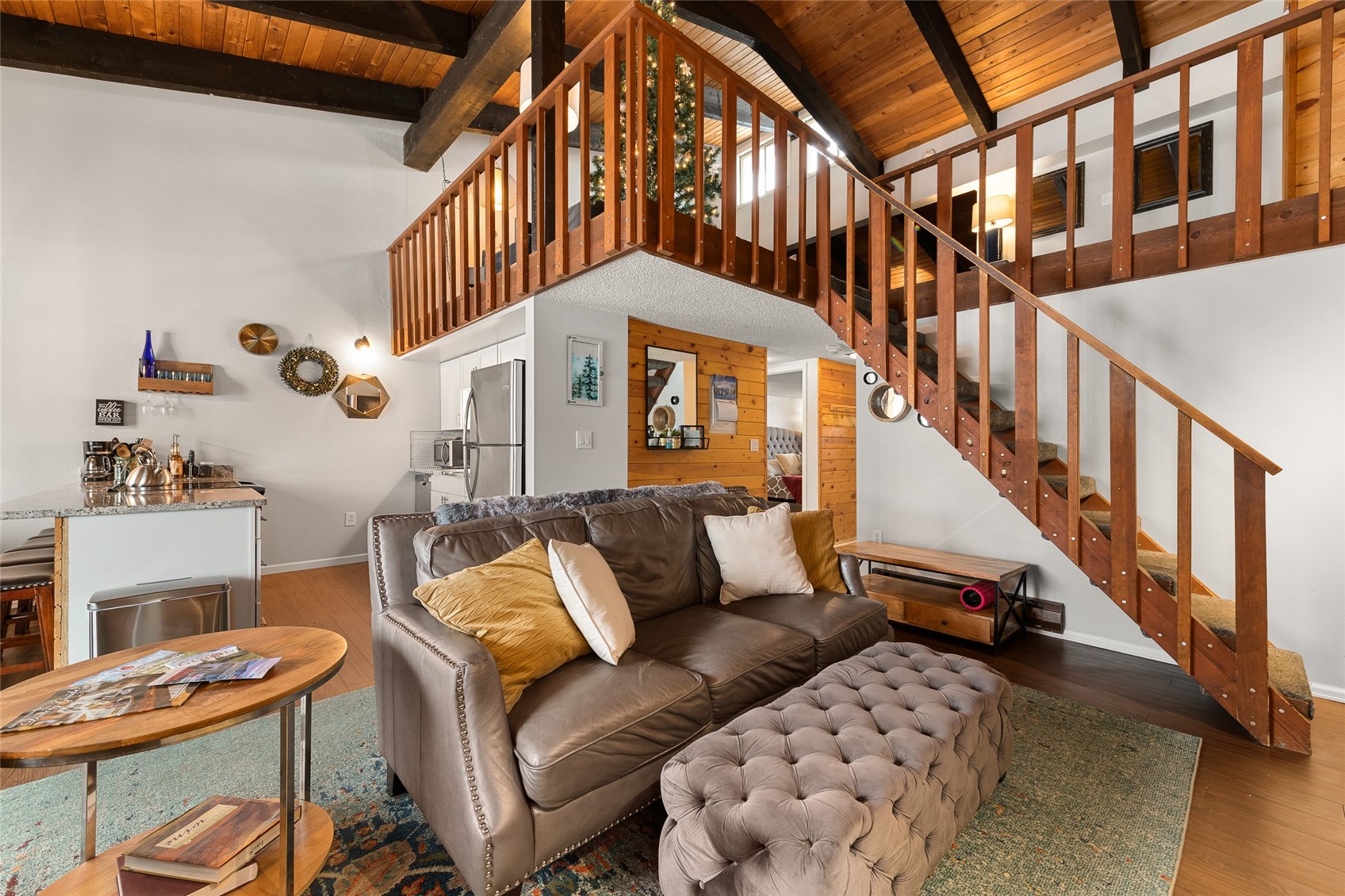 1335 Walton Creek Road, Unit 35 Steamboat Springs, CO 80487 - Photo 9 of 48 a view of entryway and hall with wooden floor