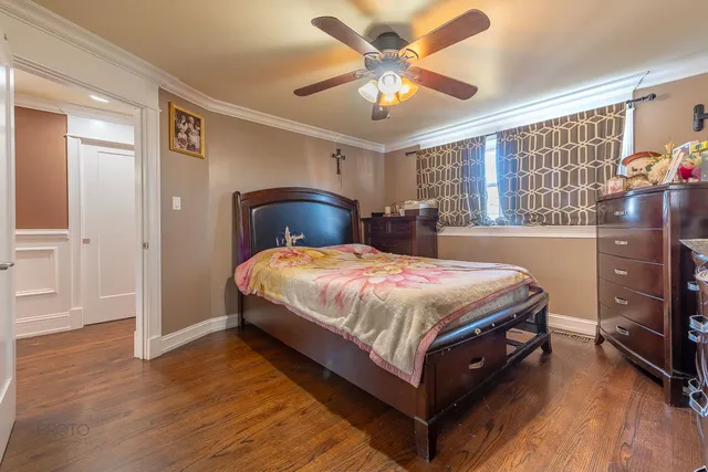 a bed room with a bed and a window