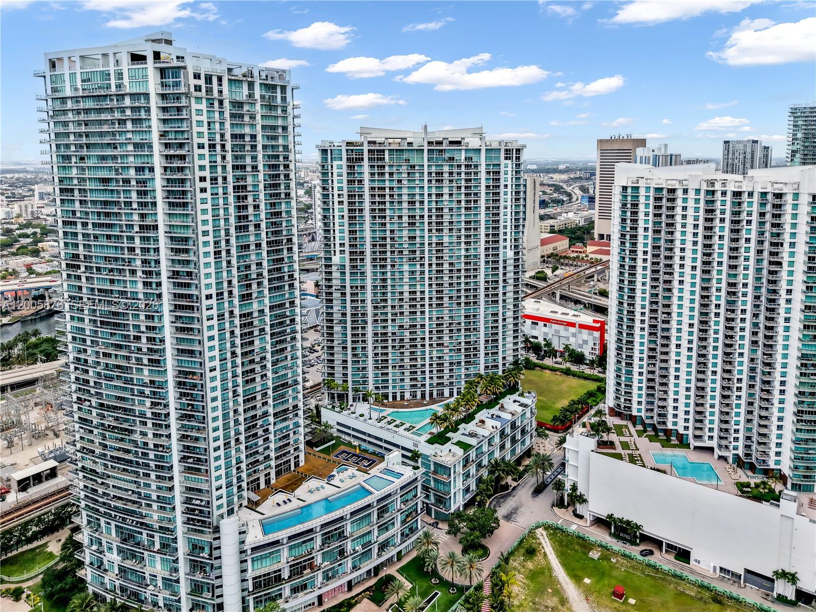 90 Southwest 3rd Street, Unit TH 308 Miami, FL 33130 - Photo 24 of 28 a view of a city with tall buildings