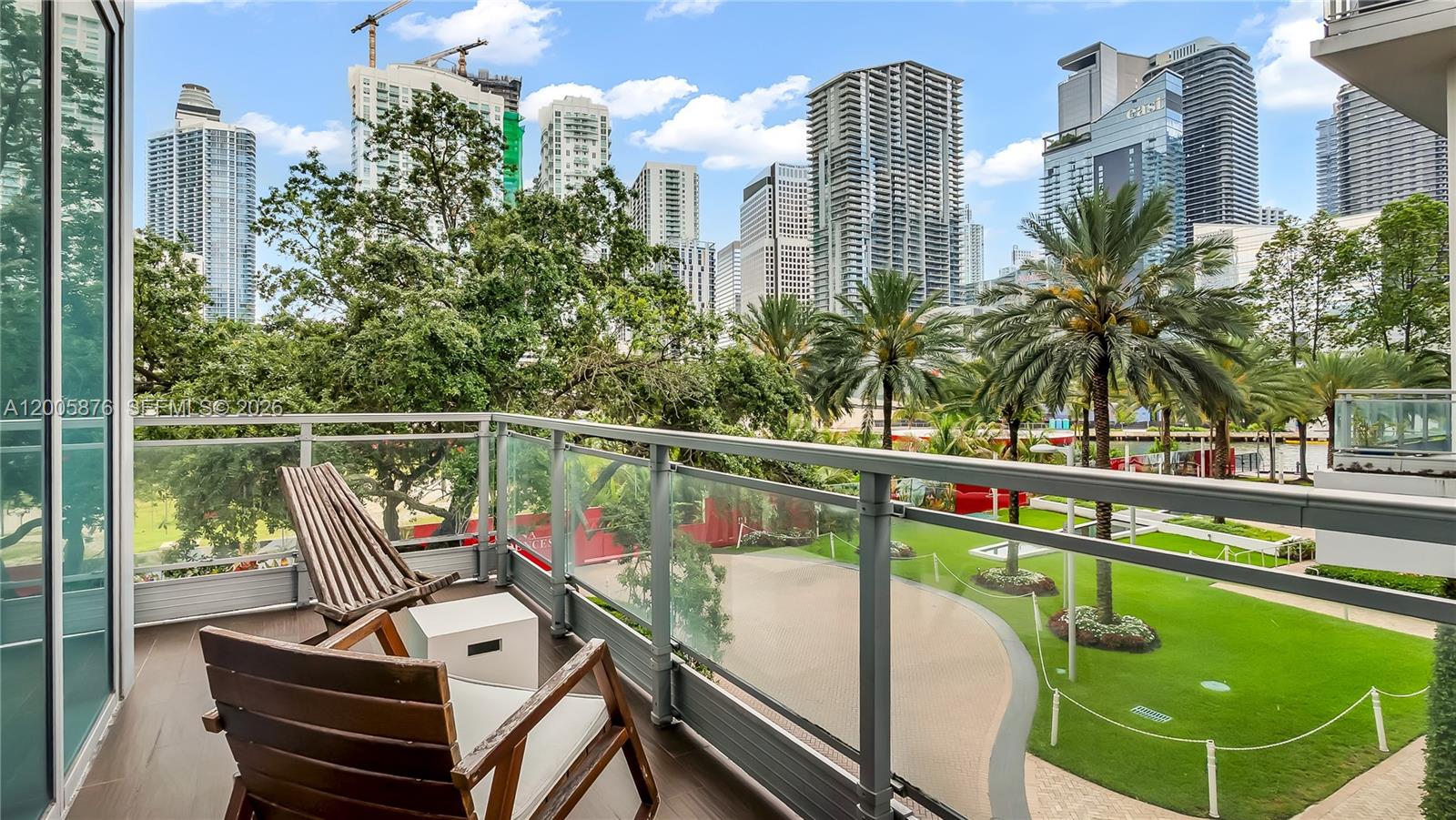 90 Southwest 3rd Street, Unit TH 308 Miami, FL 33130 - Photo 10 of 28 a view of a chairs and table in the balcony