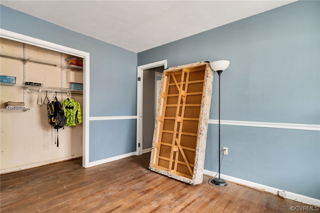 2949 Broadstreet Road Gum Spring, VA 23065 - Photo 19 of 21 an empty room with wooden floor and windows