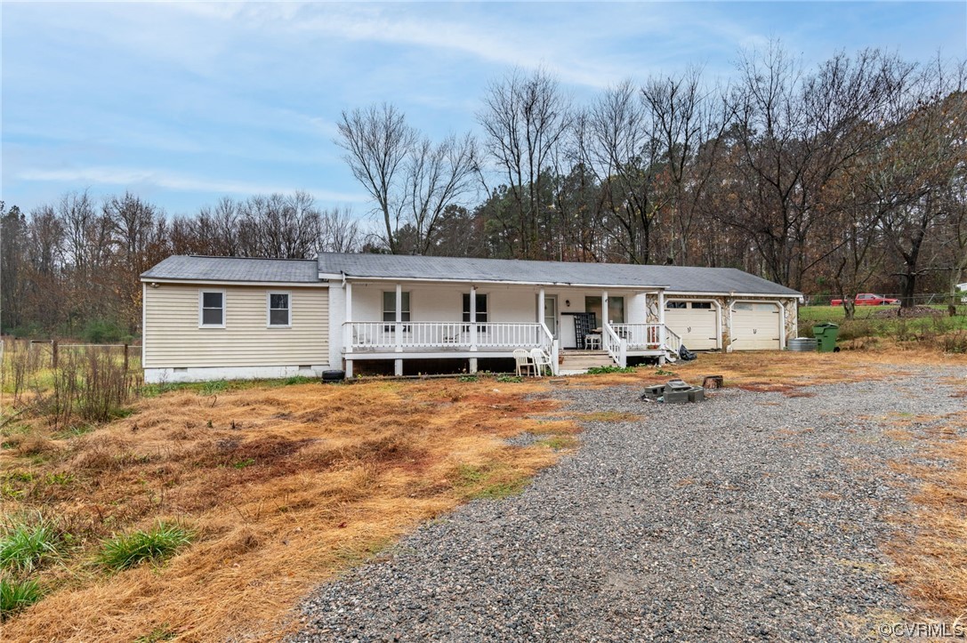 2949 Broadstreet Road Gum Spring, VA 23065 - Photo 2 of 21 a view of a house with backyard and sitting area
