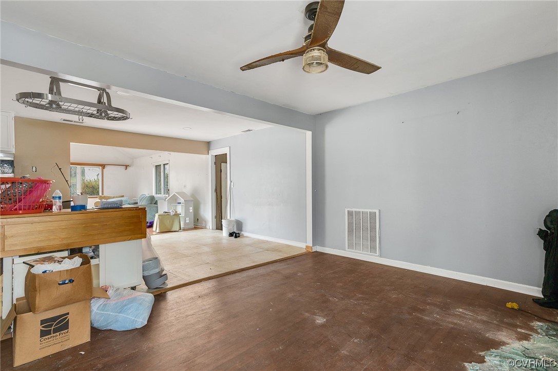 2949 Broadstreet Road Gum Spring, VA 23065 - Photo 4 of 21 a bedroom with a bed and a chandelier
