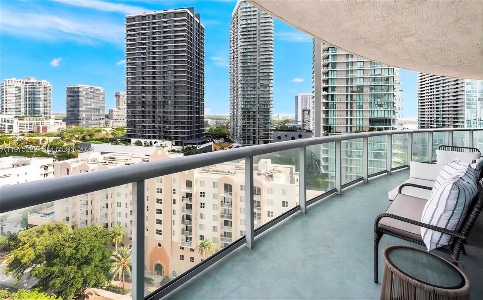 480 Northeast 30th Street, Unit 1607 Miami, FL 33137 - Photo 11 of 25 Wrap-around balcony including dinning room, living room and 2 bedrooms