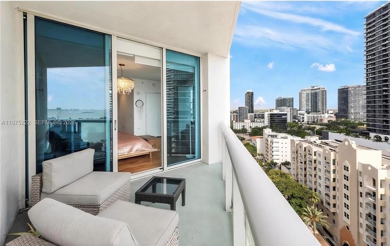 480 Northeast 30th Street, Unit 1607 Miami, FL 33137 - Photo 15 of 25 Primary bedroom private balcony