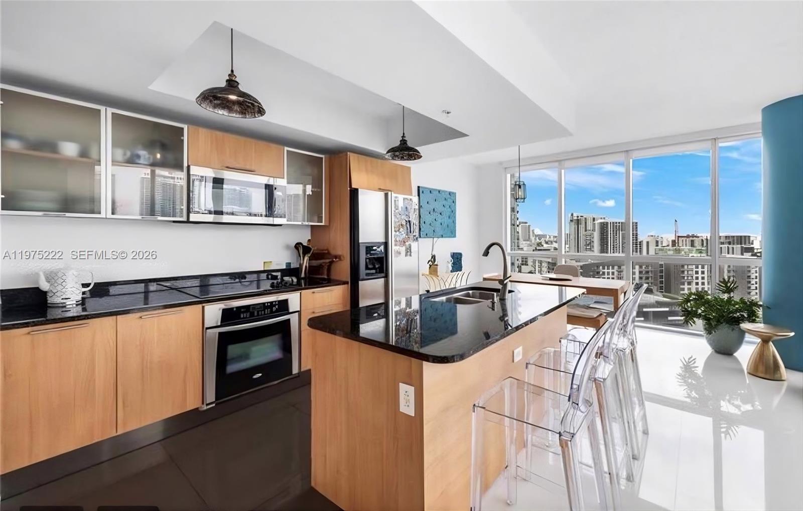480 Northeast 30th Street, Unit 1607 Miami, FL 33137 - Photo 2 of 25 Kitchen and dining room