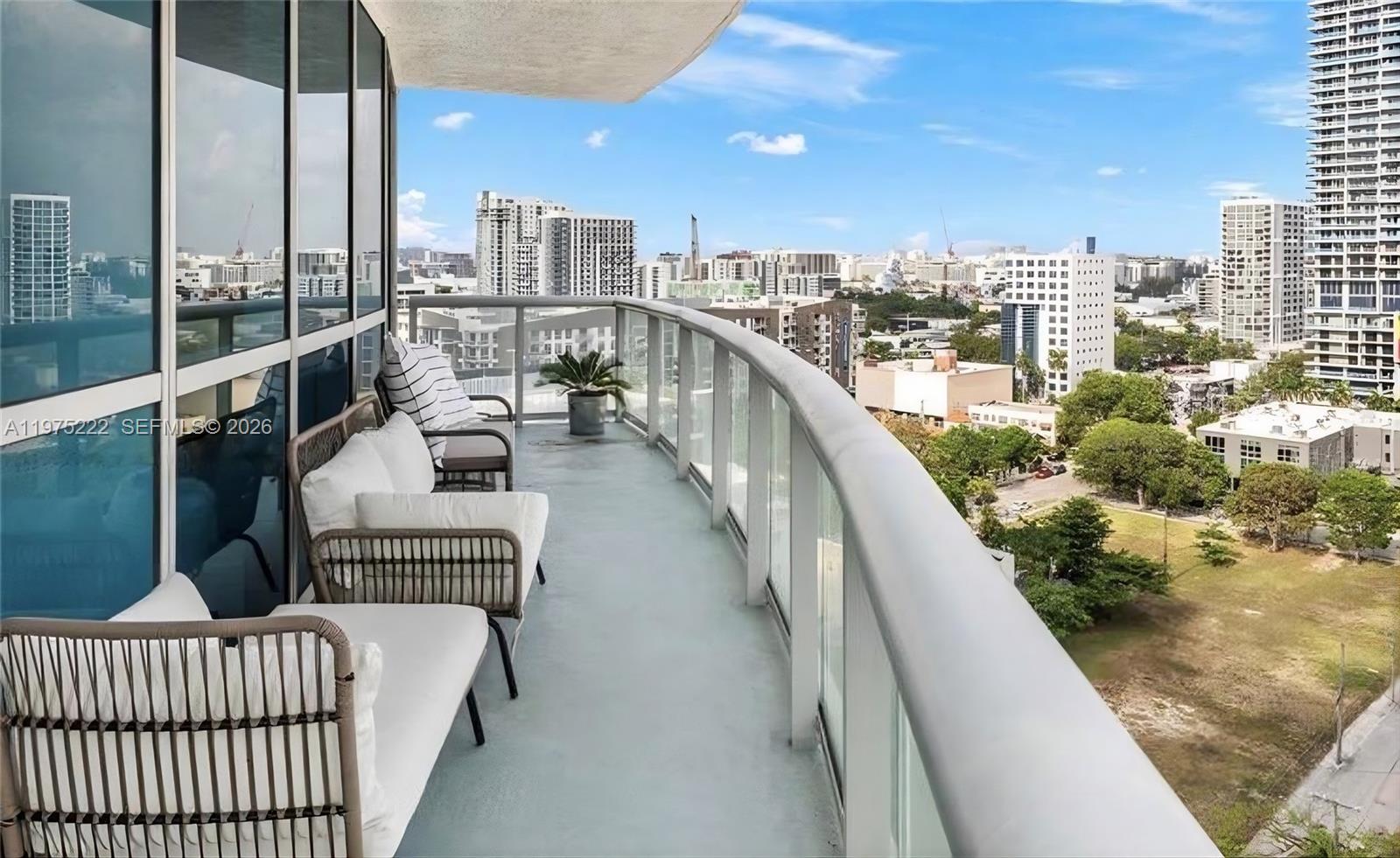 480 Northeast 30th Street, Unit 1607 Miami, FL 33137 - Photo 10 of 25 Wrap-around balcony including dinning room, living room and 2 bedrooms