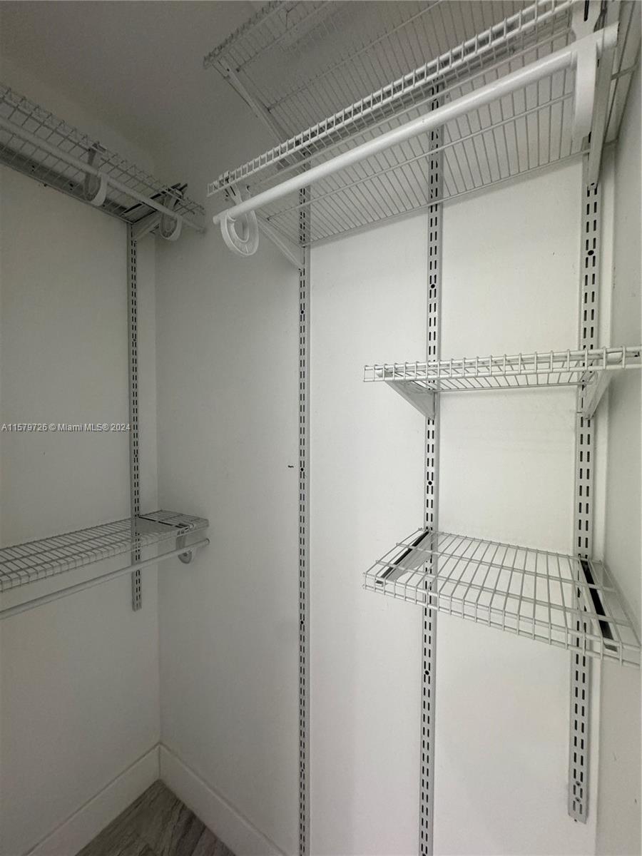 6955 Rue Vendome, Unit 2 Miami Beach, FL 33141 - Photo 13 of 21 a view of walk in closet