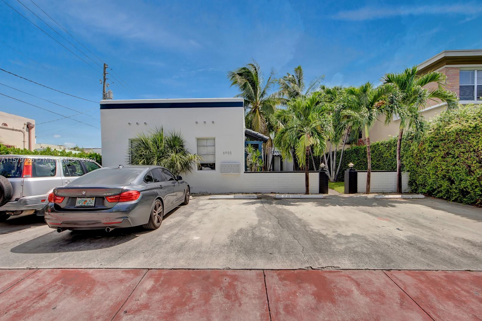 6955 Rue Vendome, Unit 2 Miami Beach, FL 33141 - Photo 18 of 21 a view of street with parked cars