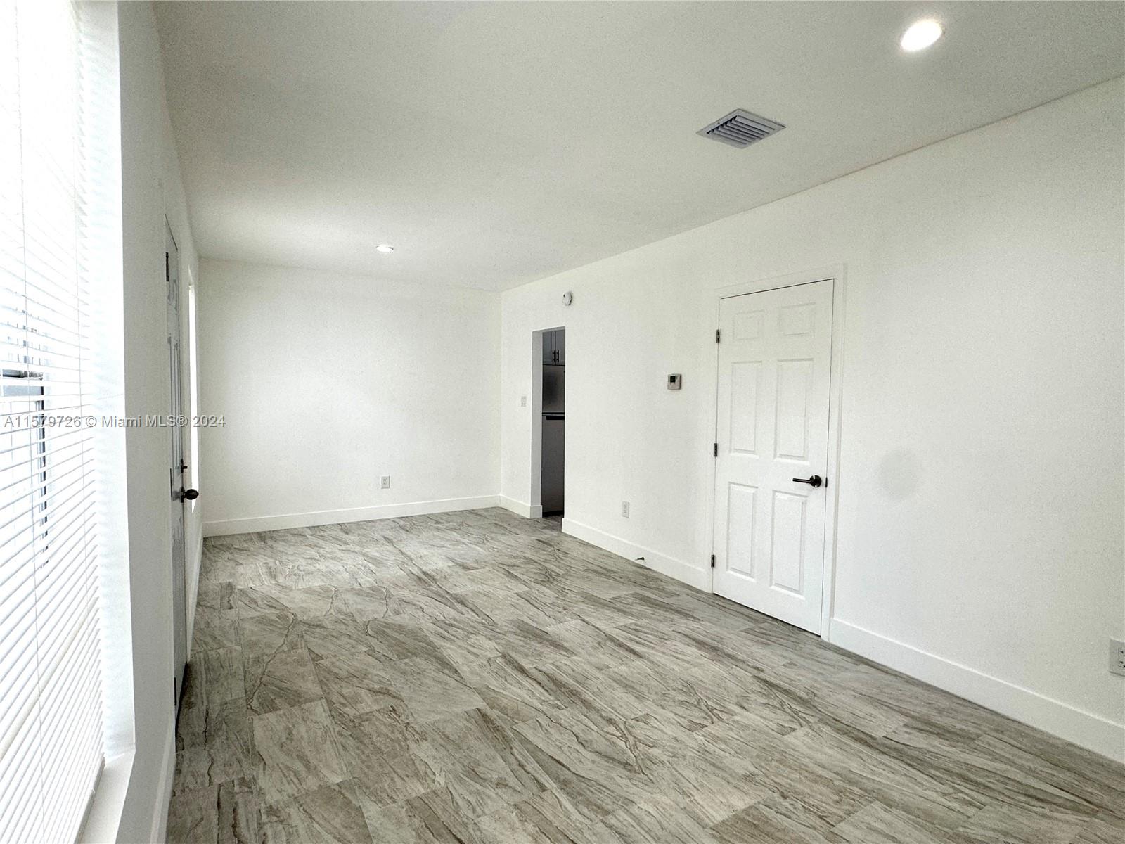 6955 Rue Vendome, Unit 2 Miami Beach, FL 33141 - Photo 6 of 21 a view of an empty room